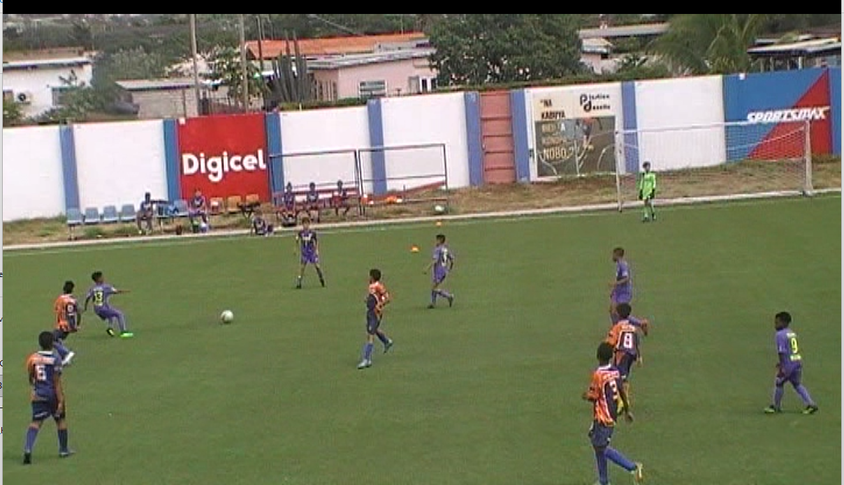 Youth football match on a pitch in Curaçao